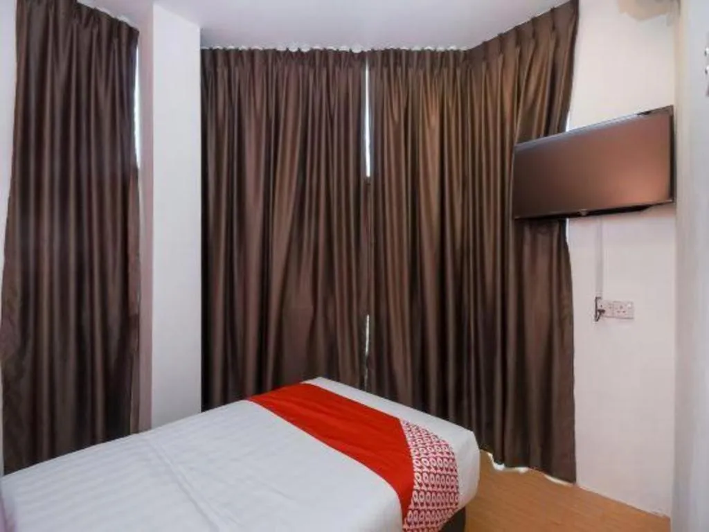 Bed in OYO 1111 Harmony Stay