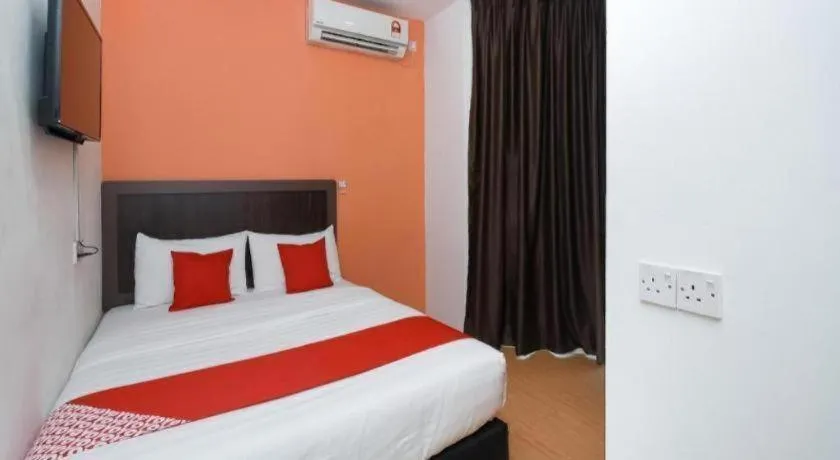 Bed in OYO 1111 Harmony Stay