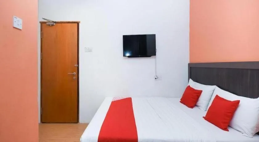 Bed in OYO 1111 Harmony Stay