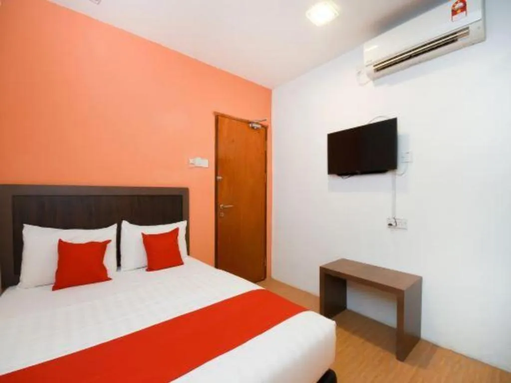 Bed in OYO 1111 Harmony Stay