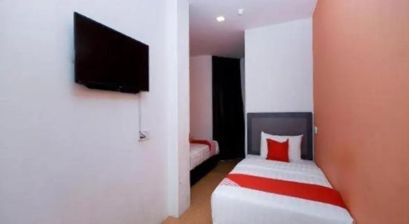 Bed in OYO 1111 Harmony Stay