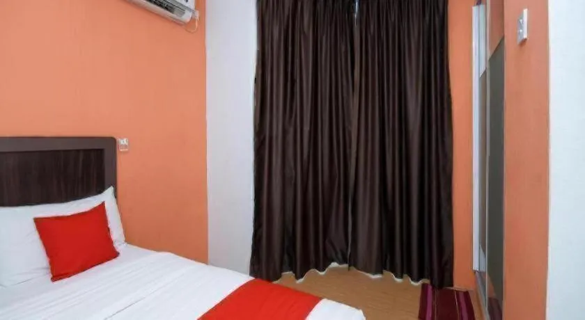 Bed in OYO 1111 Harmony Stay