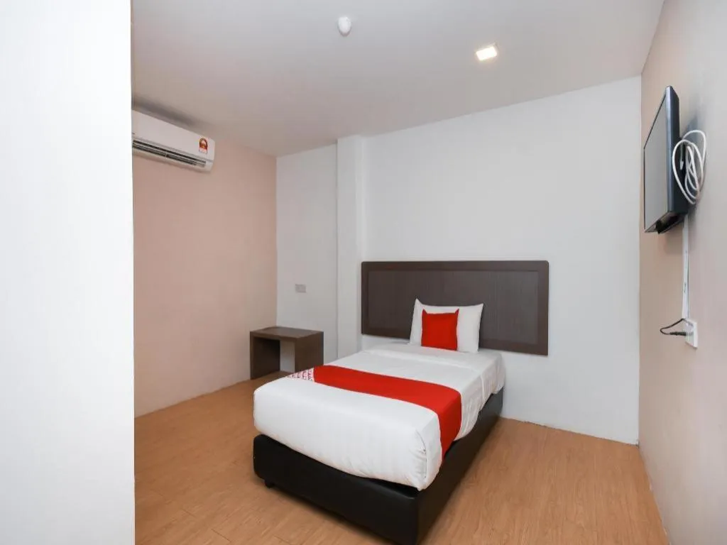 Bed in OYO 1111 Harmony Stay