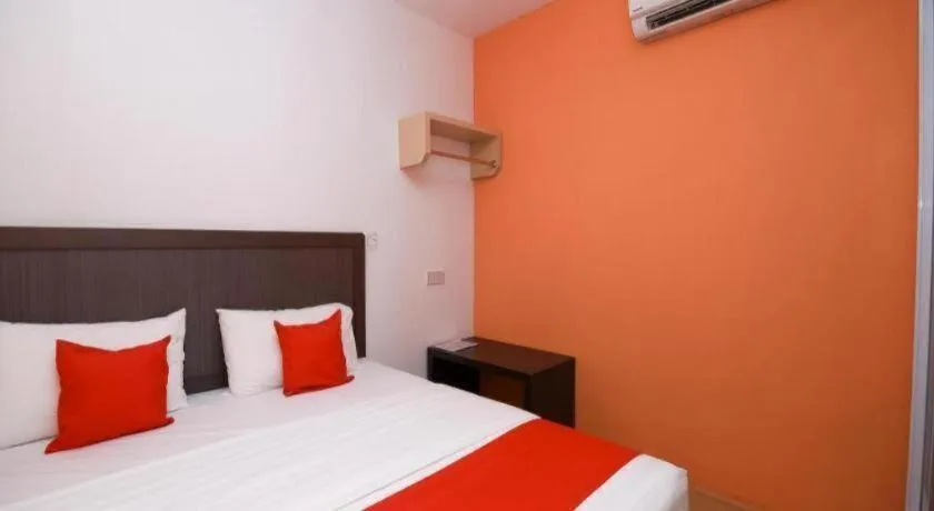 Bed in OYO 1111 Harmony Stay