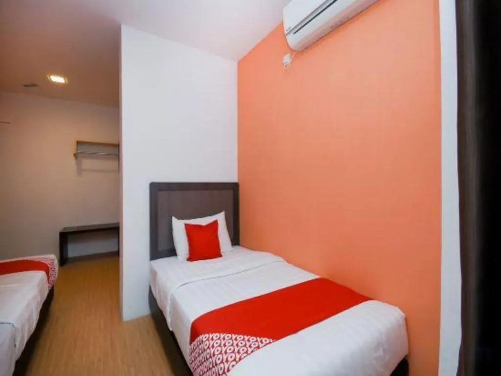 Bed in OYO 1111 Harmony Stay