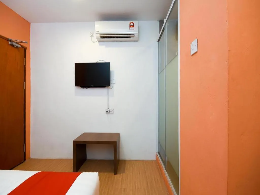 Bed in OYO 1111 Harmony Stay