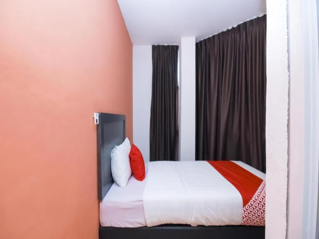 Bed in OYO 1111 Harmony Stay