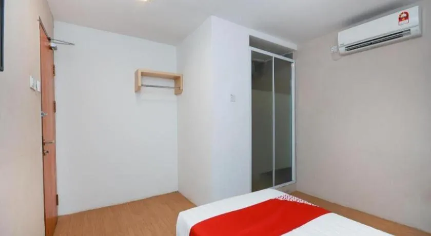 Bed in OYO 1111 Harmony Stay