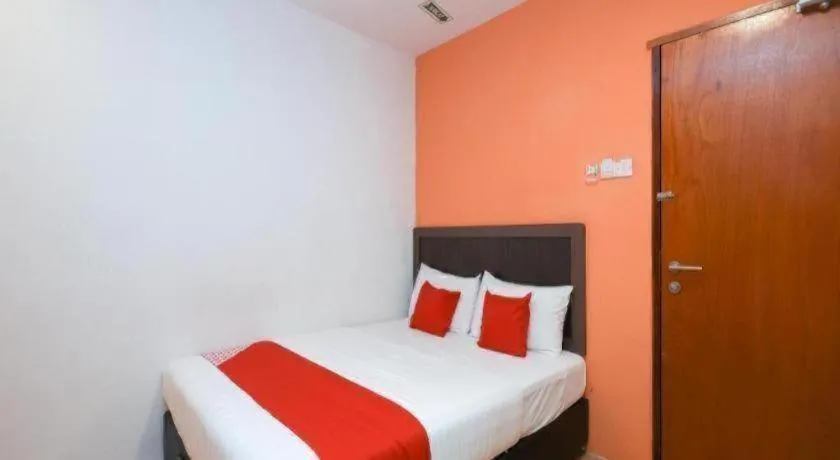 Bed in OYO 1111 Harmony Stay