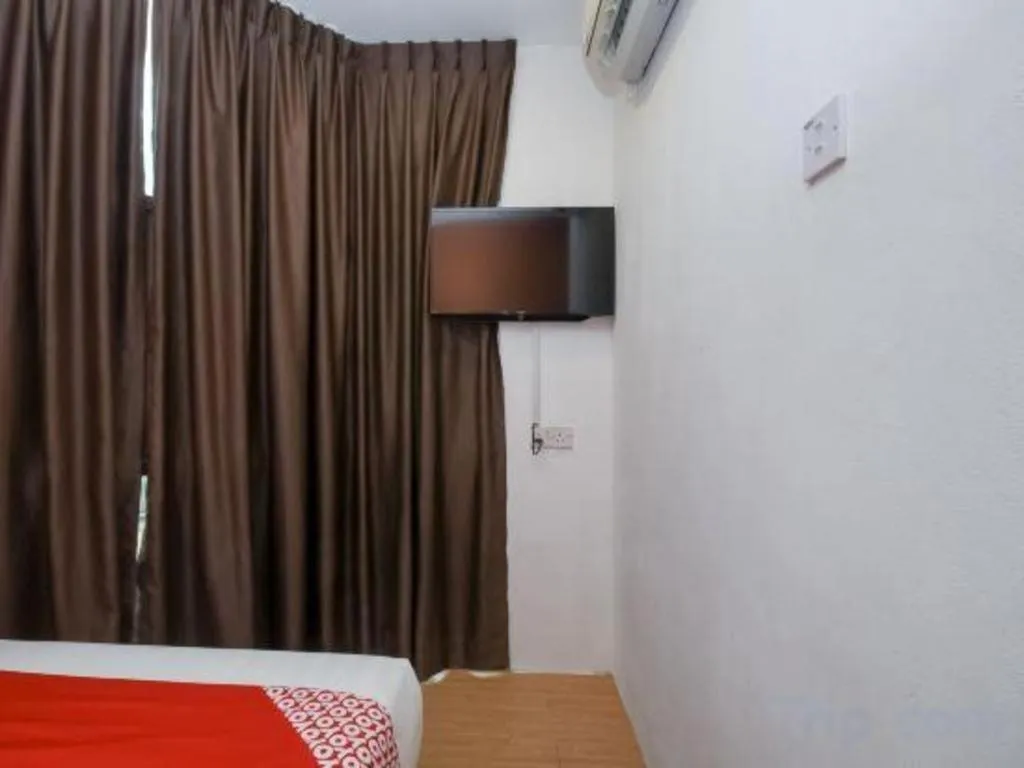 Bed in OYO 1111 Harmony Stay