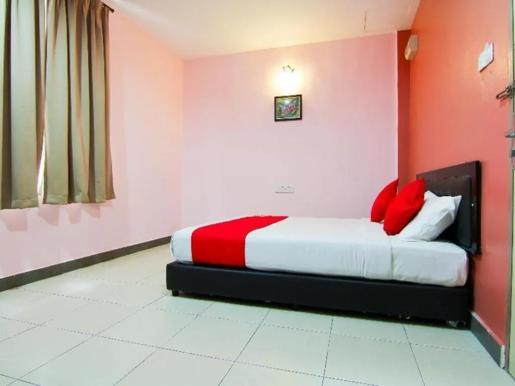 Bed in OYO 11343 Hotel Putra Iskandar