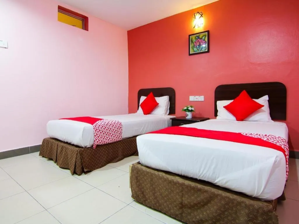 Bed in OYO 11343 Hotel Putra Iskandar