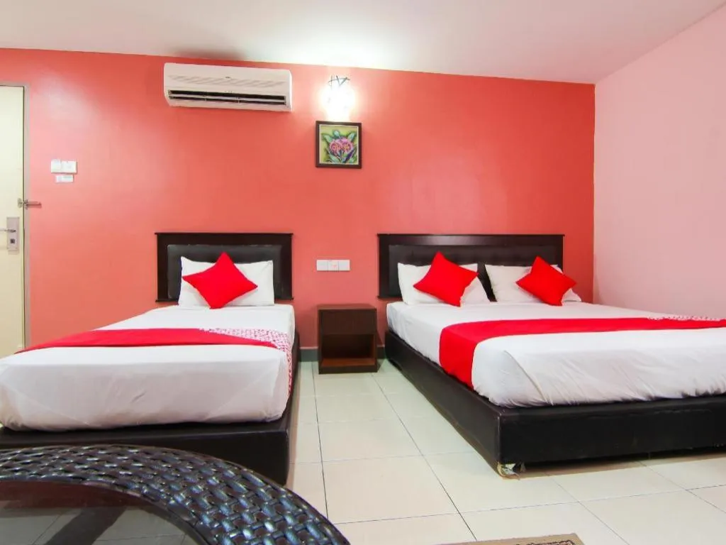 Bed in OYO 11343 Hotel Putra Iskandar