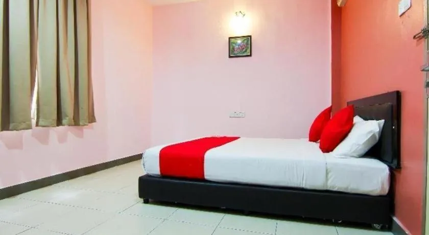 Bed in OYO 11343 Hotel Putra Iskandar