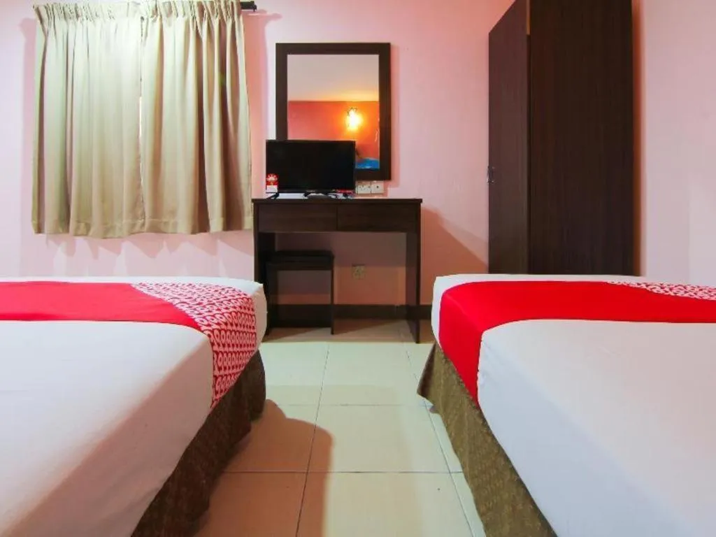 Bed in OYO 11343 Hotel Putra Iskandar