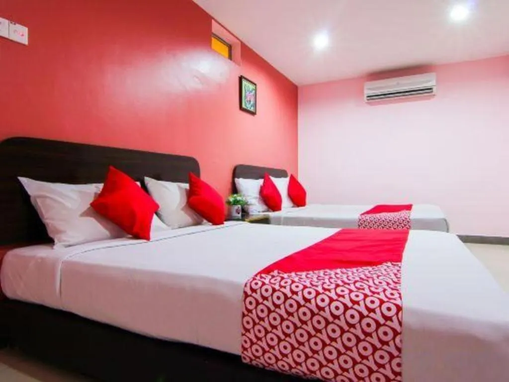 Bed in OYO 11343 Hotel Putra Iskandar