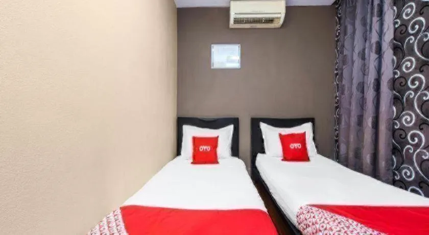 Bed in OYO 44123 EL SAIF HOTEL