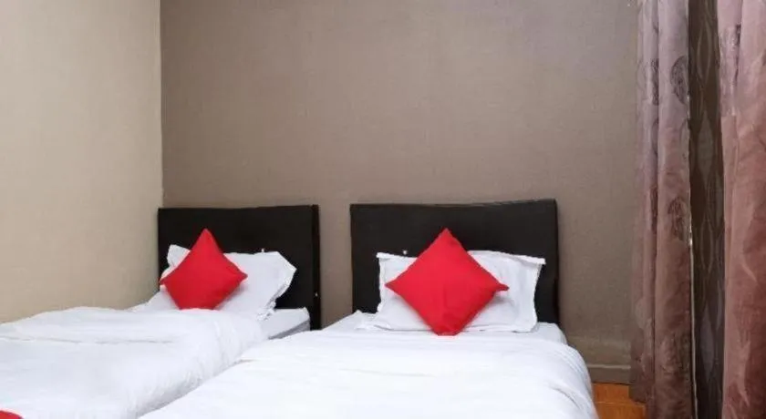 Bed in OYO 44123 EL SAIF HOTEL