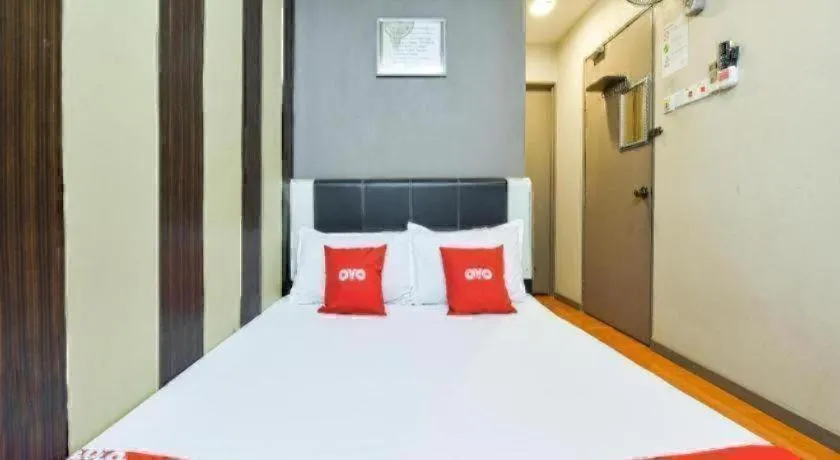 Bed in OYO 44123 EL SAIF HOTEL