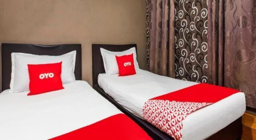 Bed in OYO 44123 EL SAIF HOTEL