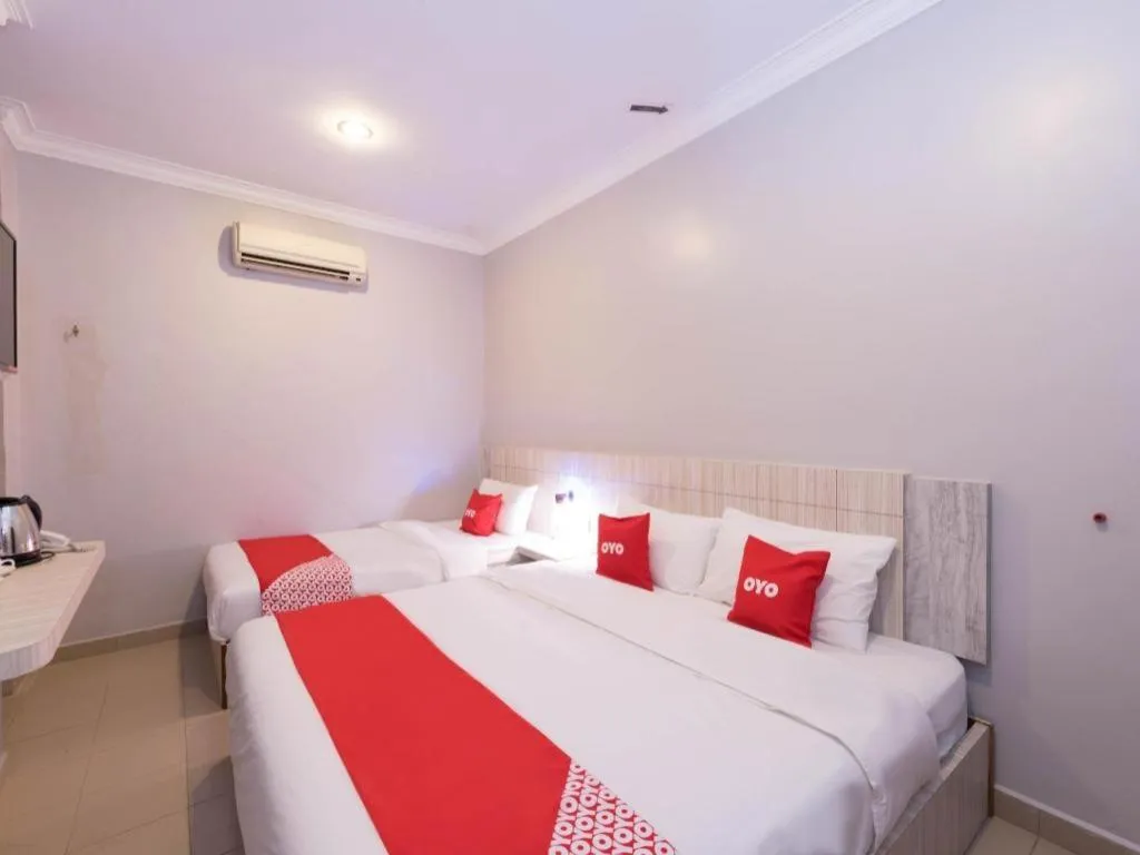 Bed in Capital O 89366 Spring Inn Hotel