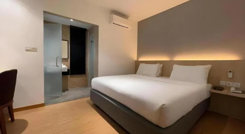 Bed in MIYABI HOTEL PERMAS