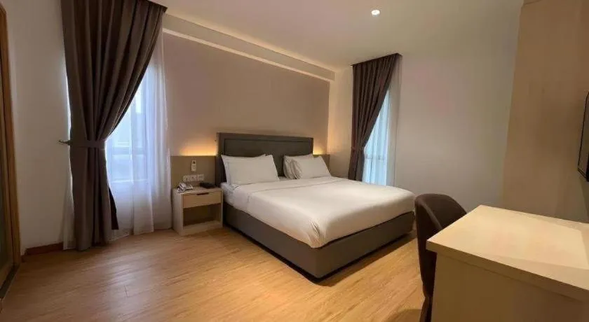 Bed in MIYABI HOTEL PERMAS