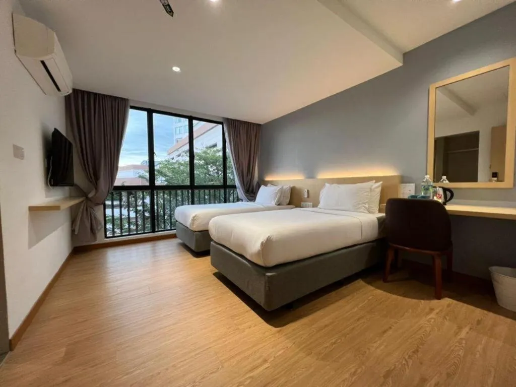 Bed in MIYABI HOTEL PERMAS