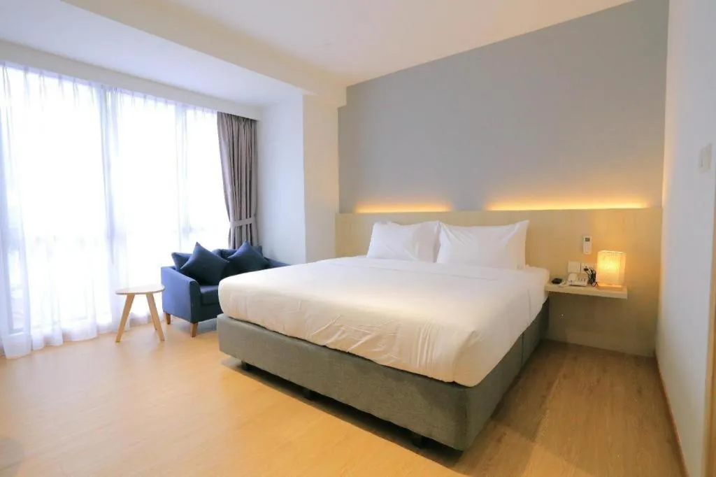 Bed in MIYABI HOTEL PERMAS