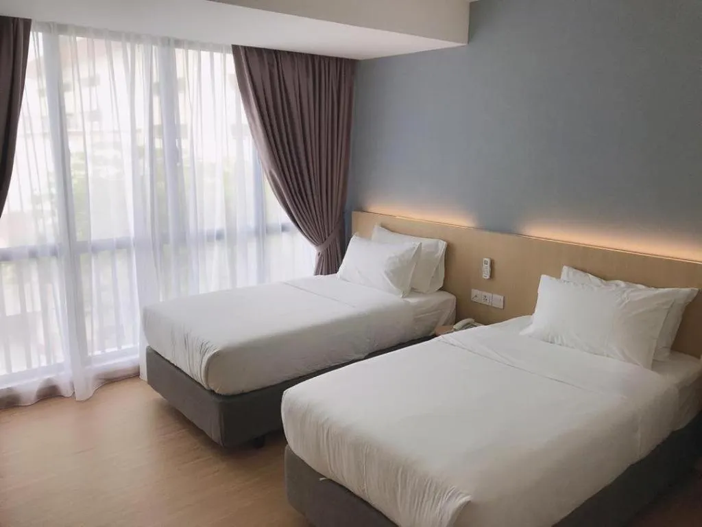 Bed in MIYABI HOTEL PERMAS