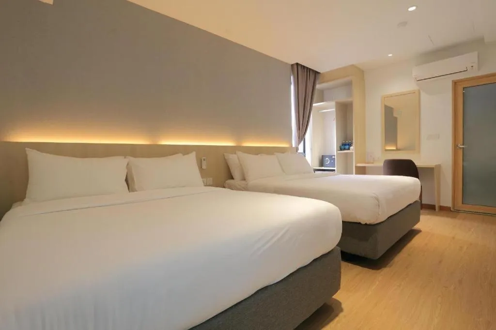 Bed in MIYABI HOTEL PERMAS