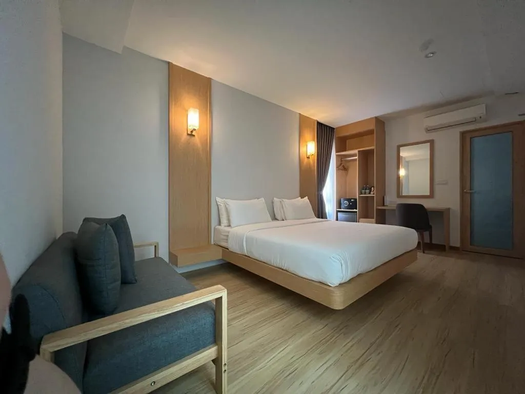 Bed in MIYABI HOTEL PERMAS