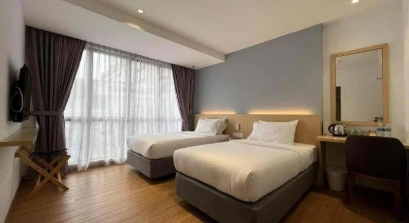 Bed in MIYABI HOTEL PERMAS