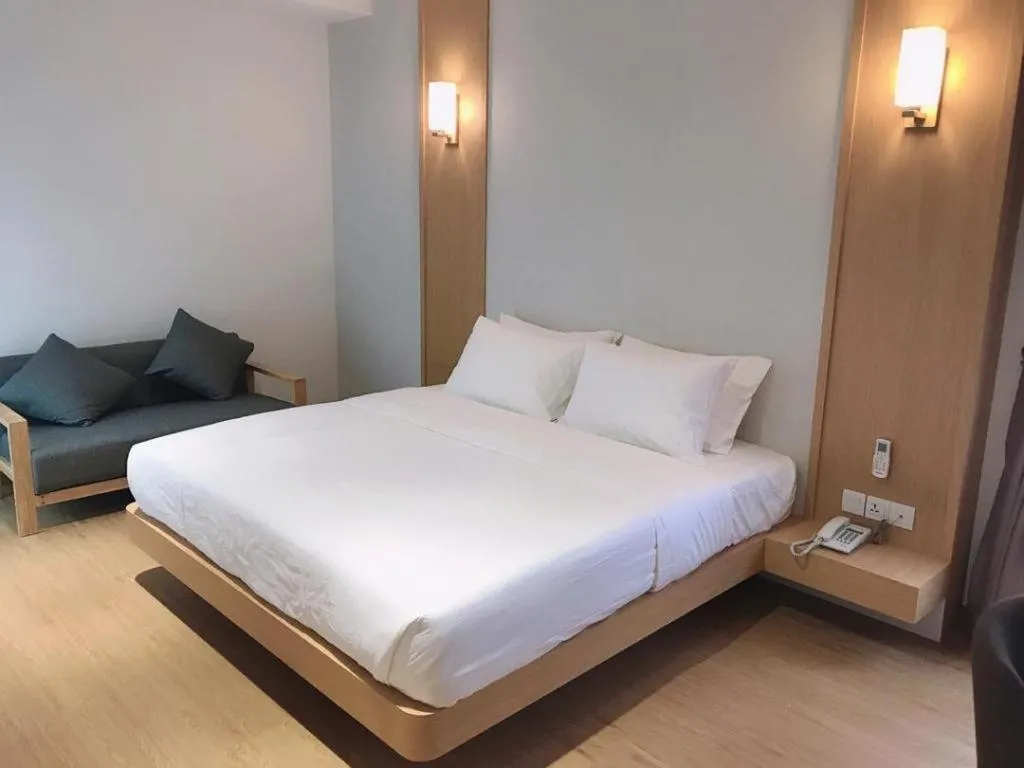 Bed in MIYABI HOTEL PERMAS