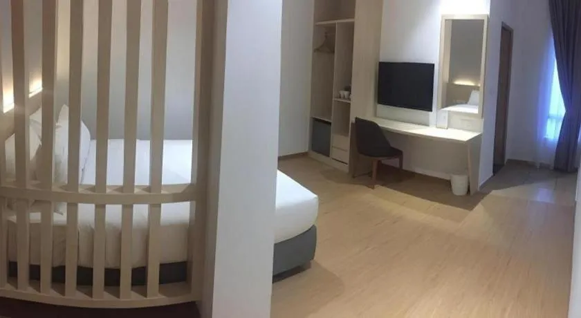 Bed in MIYABI HOTEL PERMAS