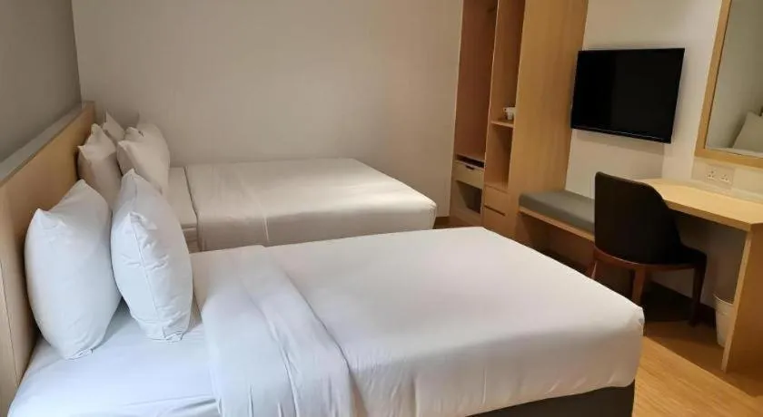 Bed in MIYABI HOTEL PERMAS