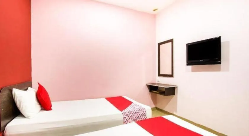 Bed in OYO 89539 Hotel Siswa
