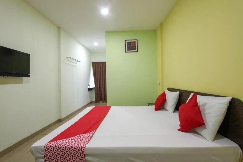 Bed in OYO 89539 Hotel Siswa
