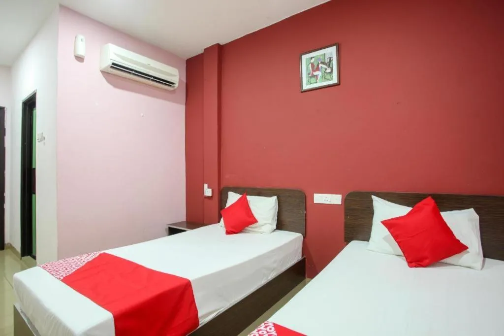 Bed in OYO 89539 Hotel Siswa