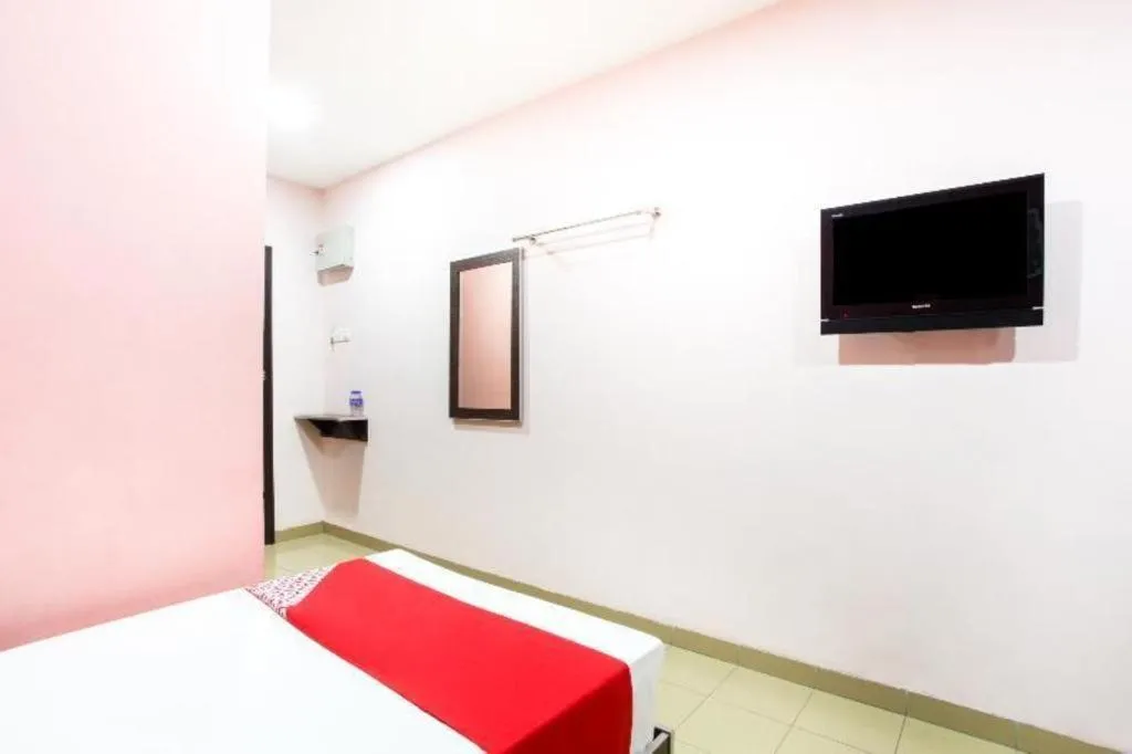 Bed in OYO 89539 Hotel Siswa
