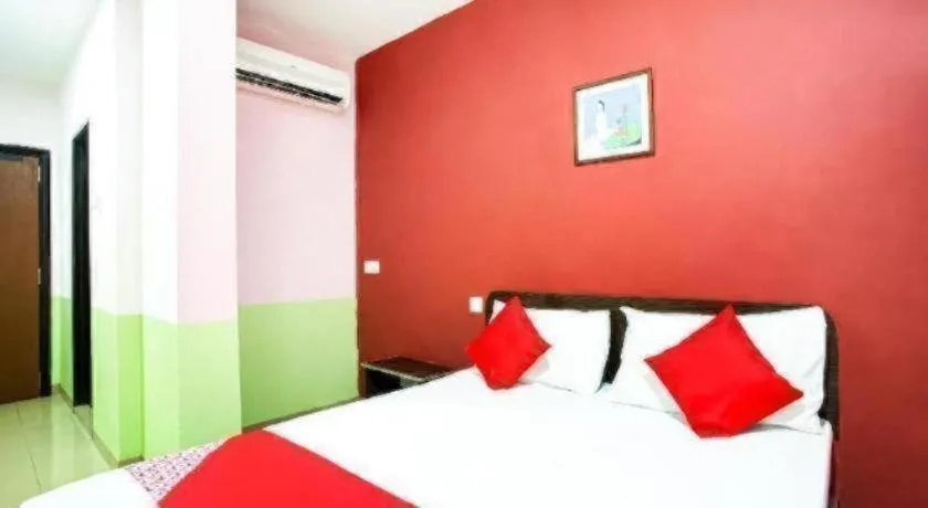 Bed in OYO 89539 Hotel Siswa