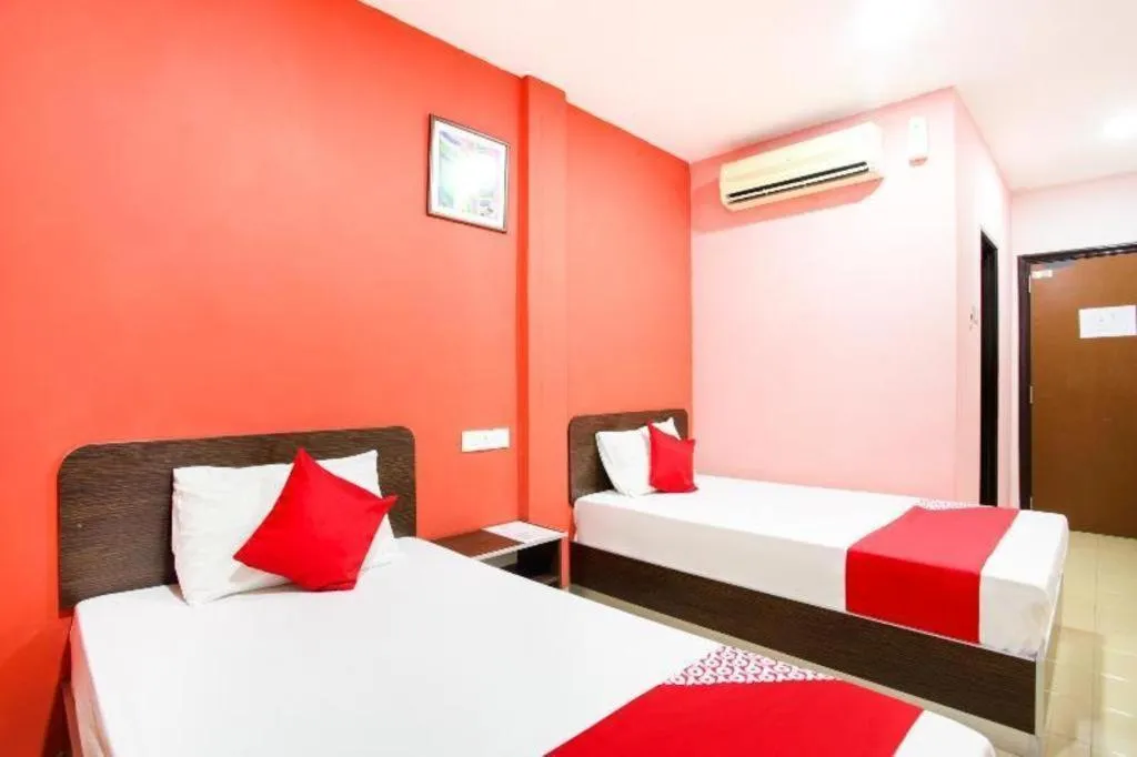 Bed in OYO 89539 Hotel Siswa