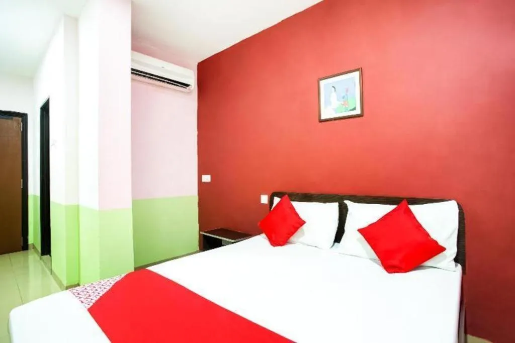 Bed in OYO 89539 Hotel Siswa