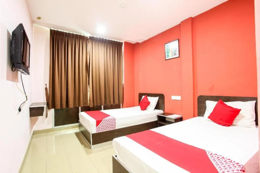 Bed in OYO 89539 Hotel Siswa