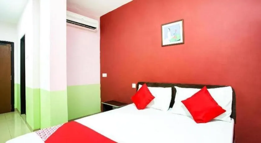 Bed in OYO 89539 Hotel Siswa