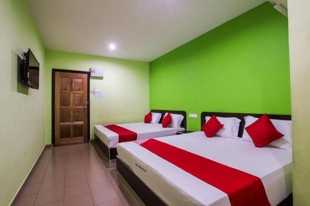 Bed in OYO 89539 Hotel Siswa