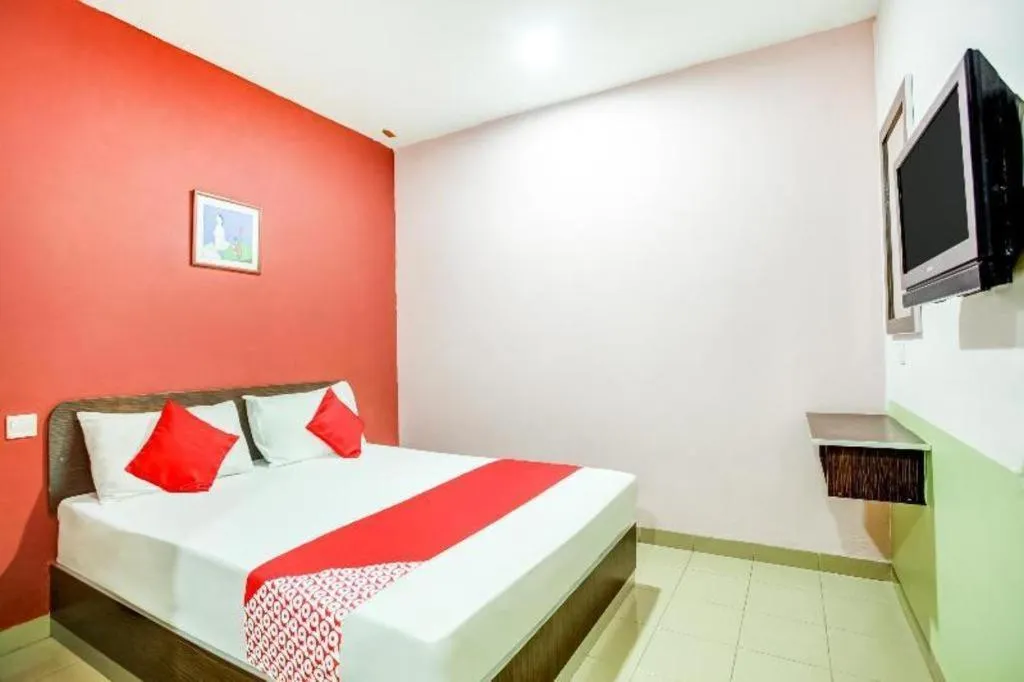 Bed in OYO 89539 Hotel Siswa