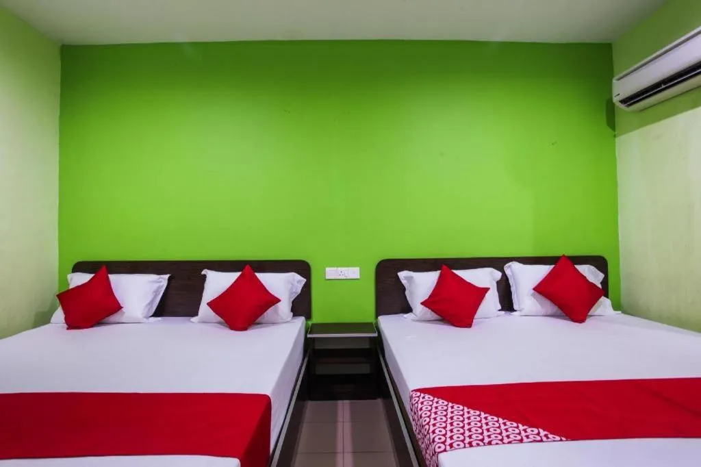 Bed in OYO 89539 Hotel Siswa