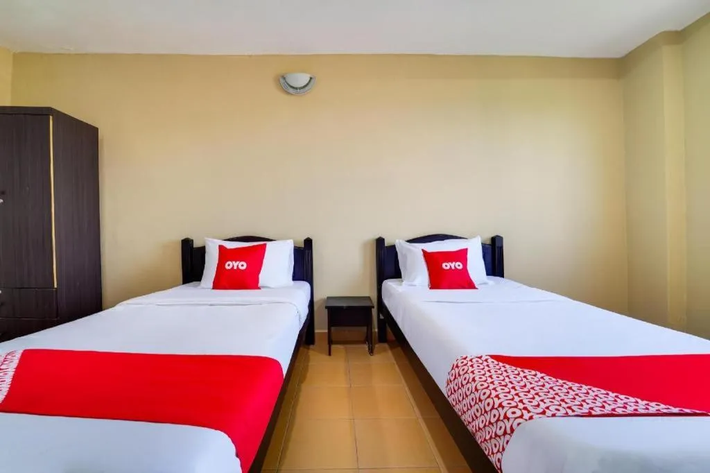 Bed in OYO 44058 MOTEL SRE BAYAM