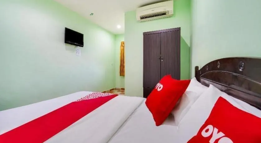 Bed in OYO 44058 MOTEL SRE BAYAM
